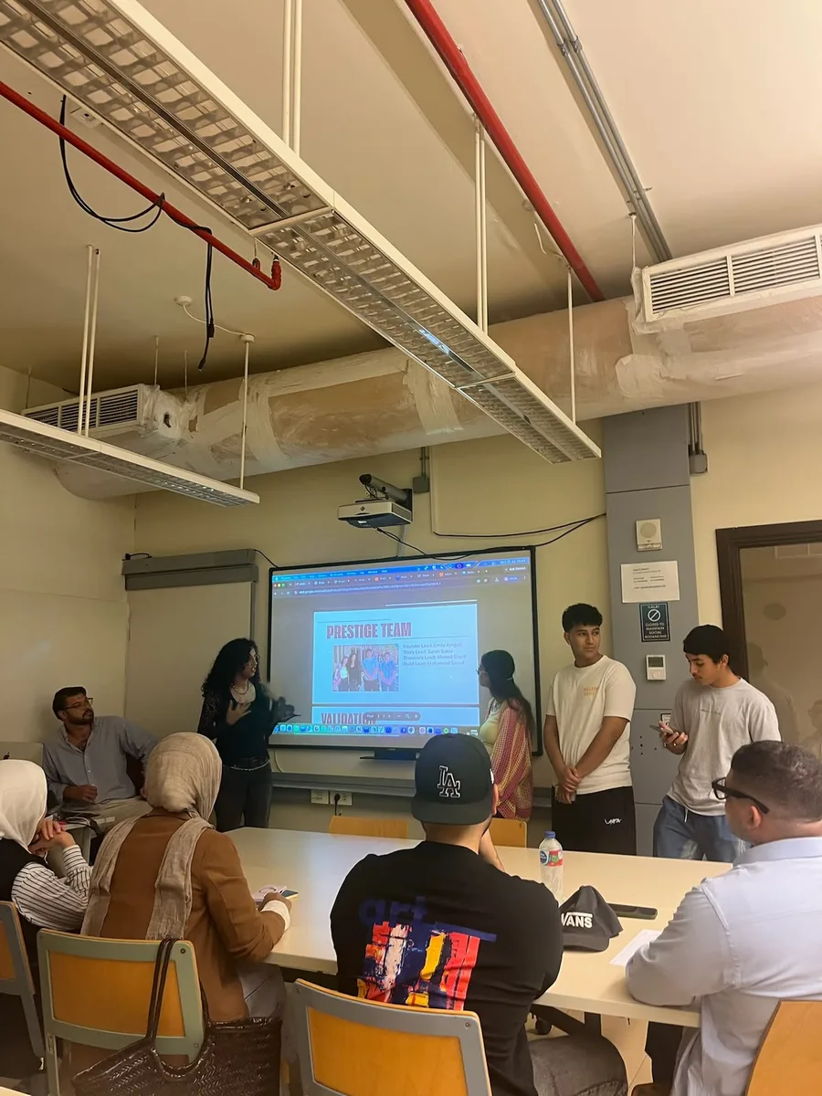Prestige Team presenting their venture to judges at the Startopia AUC Bootcamp pitch day