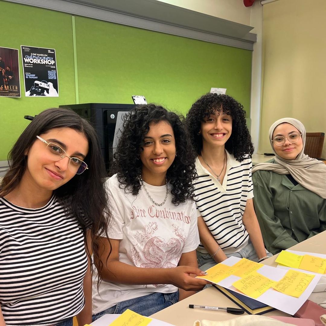 A team of four teenage founders with their evidence notes