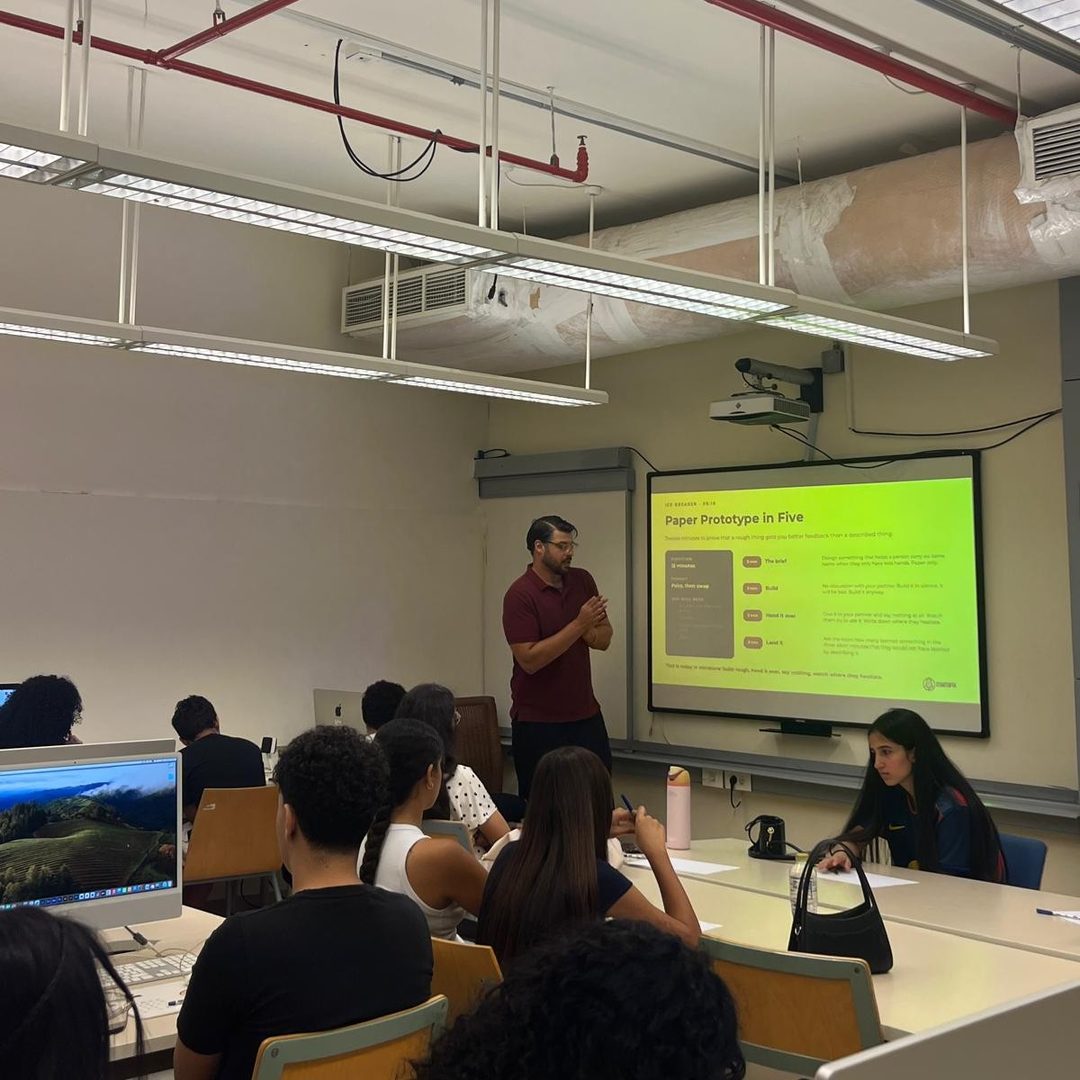 A coach leading a session with the cohort